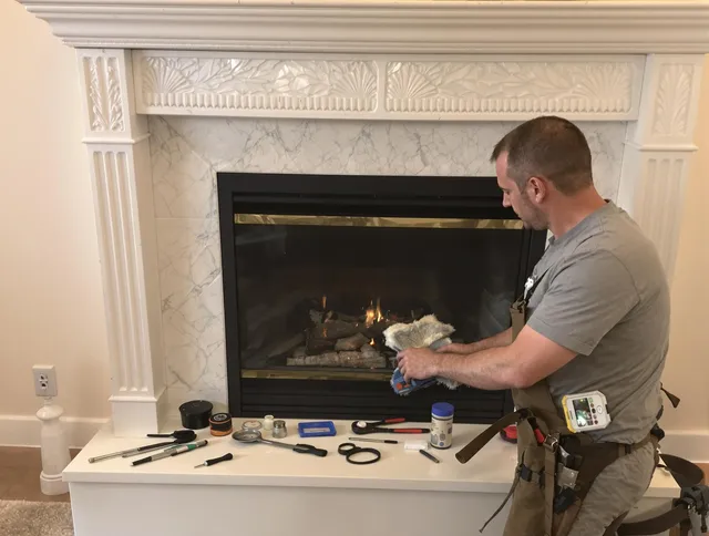 Wadsworth Chimney Sweep performing fireplace maintenance in Wadsworth, OH