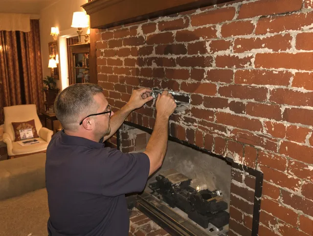 Wadsworth Chimney Sweep expert fixing a fireplace in Wadsworth, OH
